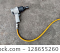 Pneumatic Impact Wrench, auto service, repair and maintenance concept, Closeup top view. 128655260