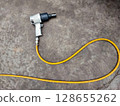 Pneumatic Impact Wrench, auto service, repair and maintenance concept, Closeup top view. 128655262