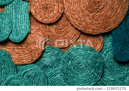 Background of different colors of textures of threads connected together. Abstract textile background Background of different colors of textures of threads connected together. Abstract textile background 128655270