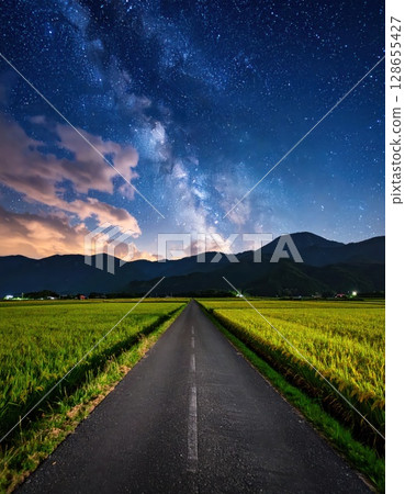 AI image: Country road at night with stars shining 128655427