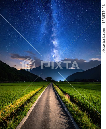 AI image: Country road at night with stars shining 128655428