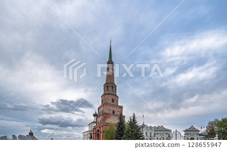 The ancient leaning red brick Syuyumbike Tower on the territory of the Kazan Kremlin. Russia 128655947
