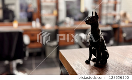 A meticulously crafted and elegantly designed bronze figurine of a Doberman, ideal for dog enthusiasts and home decor 128656390