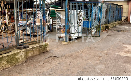 This is a detailed glimpse of an industrial storage area featuring a wide variety of equipment and machinery This is a detailed glimpse of an industrial storage area featuring a wide variety of equipment and machinery 128656393