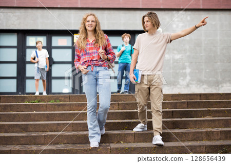 Teenagers going home after school 128656439