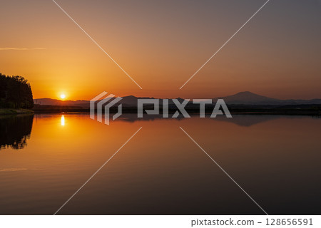 Mt. Chokai and the sunset seen from Nonomura Reservoir Mt. Chokai and the sunset seen from Nonomura Reservoir 128656591