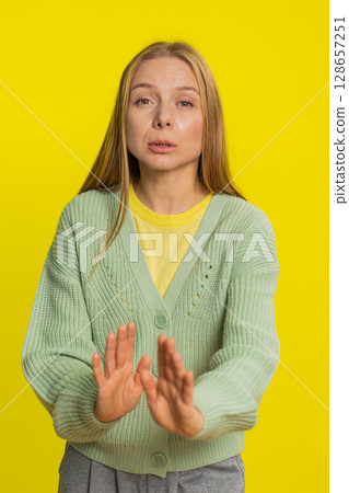 Strict mature woman warning hands gesture, saying no, be careful, advice to avoid danger, caution Strict mature woman warning hands gesture, saying no, be careful, advice to avoid danger, caution 128657251