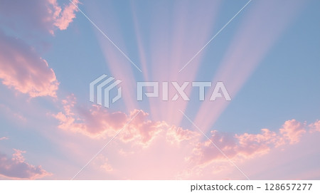 Vibrant sunset sky with dynamic light trails 128657277