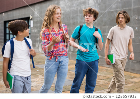 School friends walk after class School friends walk after class 128657932