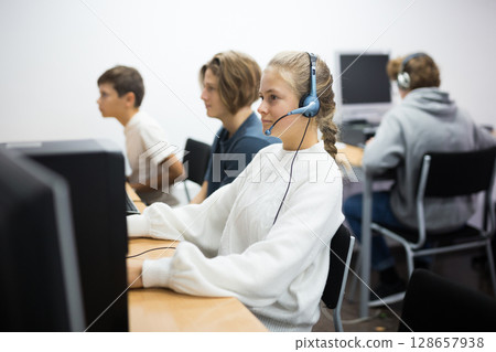 Teenager girl using computer in classroom 128657938