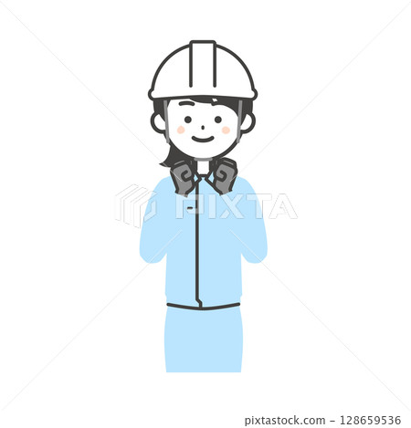 圖：一名身穿工作服、頭戴頭盔、雙手放在身體前方的婦女 128659536