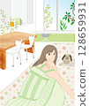 Girl relaxing with dog in living room 128659931