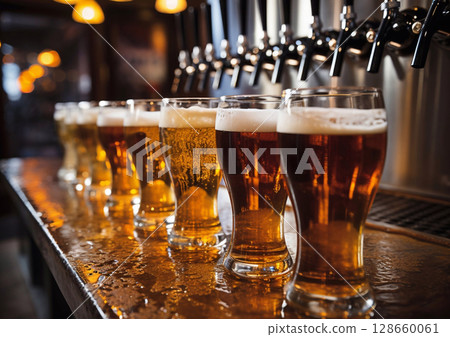 Freshly poured glasses of lager craft beer on bar counter in evening pub.Macro.AI Generative 128660061