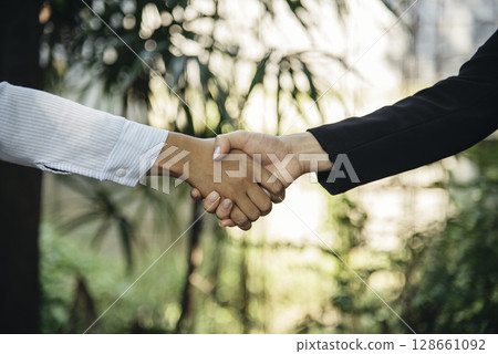 Banner Trust honesty business customer handshake together promise partner. Panorama Businessman teamwork diversity solidarity team Partner hands together. Team meeting shaking hands with copy space 128661092