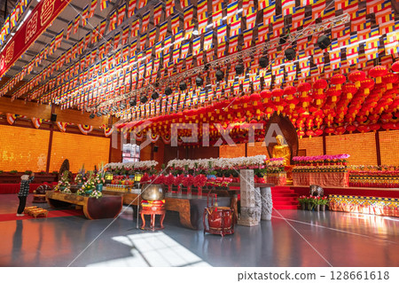 Chinese old woman sacred gold Buddha in Lognhua temple, Shanghai 128661618