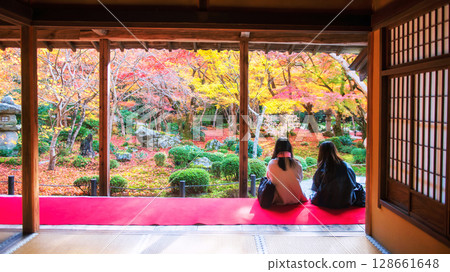 Japanese young friends on Enkoji temple terrace view fall garden, Kyoto Japanese young friends on Enkoji temple terrace view fall garden, Kyoto 128661648
