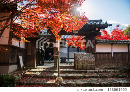 Manshuin temple entrance with red maple leaf in autumn, Kyoto Manshuin temple entrance with red maple leaf in autumn, Kyoto 128661663