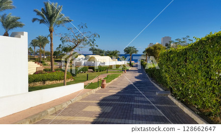 beautiful territory of the hotel with swimming pools by the sea beautiful territory of the hotel with swimming pools by the sea 128662647