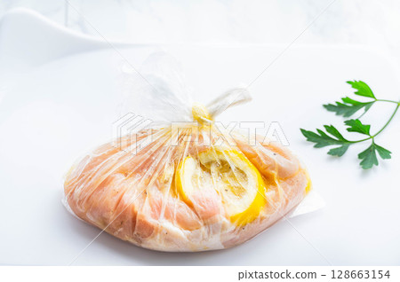 Marinated chicken breast 128663154