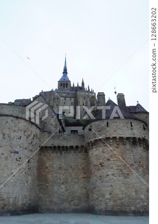 A magnificent composition looking up at the Mont Saint-Michel Abbey 128663202