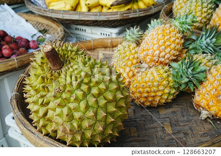 Durian and pineapple at the market 128663207