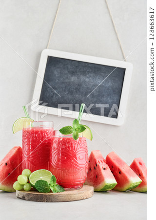 Fresh watermelon juice with framed chalk board. 128663617