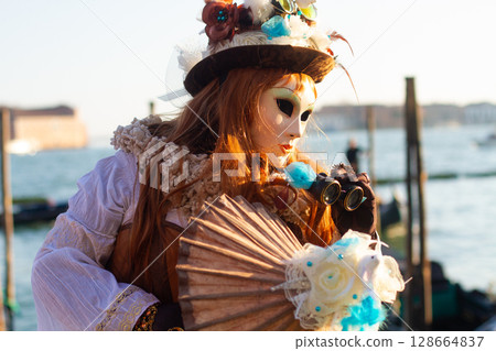 beautiful venetian masks on people during carnival in venice 128664837
