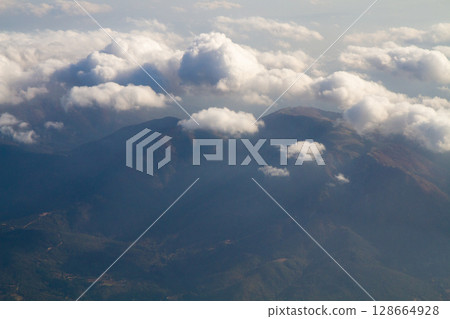 beautiful mountain landscape on high rocks from the height of the flight of the plane 128664928