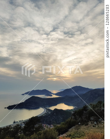 beautiful landscape from babadag mountain to Oludeniz beach in Turkey beautiful landscape from babadag mountain to Oludeniz beach in Turkey 128665283