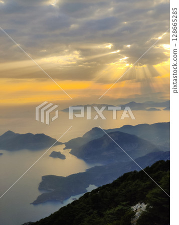 beautiful landscape from babadag mountain to Oludeniz beach in Turkey beautiful landscape from babadag mountain to Oludeniz beach in Turkey 128665285