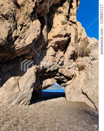 beautiful landscape of a sandy beach on the sea 128665317