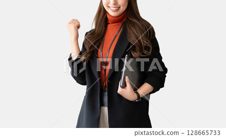 Woman/businesswoman doing a fist pump 128665733