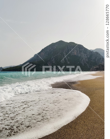 beautiful landscape of a sandy beach on the sea 128665770