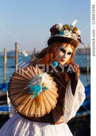 beautiful venetian masks on people during carnival in venice beautiful venetian masks on people during carnival in venice 128665886