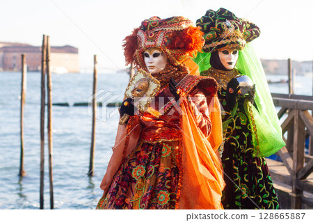 beautiful venetian masks on people during carnival in venice beautiful venetian masks on people during carnival in venice 128665887
