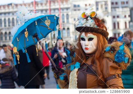 beautiful venetian masks on people during carnival in venice 128665900