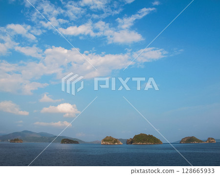 beautiful seascape on the horizon silhouette of mountains 128665933