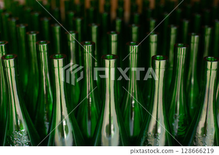 close up of many empty glass green bottles close up of many empty glass green bottles 128666219