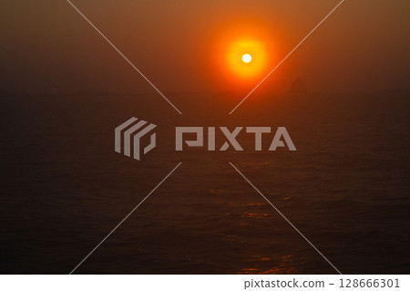 beautiful dramatic landscape of sunset on the sea beach beautiful dramatic landscape of sunset on the sea beach 128666301