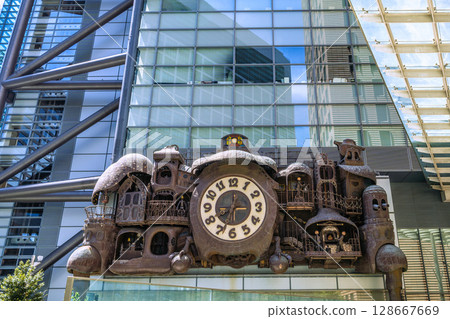 Tokyo cityscape in Japan, popular with foreign tourists. View of Shiodome's symbol, the mechanical clock "NTV Big Clock" Tokyo cityscape in Japan, popular with foreign tourists. View of Shiodome's symbol, the mechanical clock "NTV Big Clock" 128667669