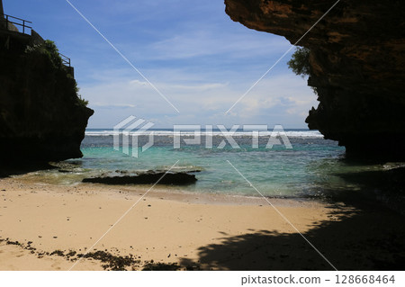 beautiful landscape of a sandy beach on the sea beautiful landscape of a sandy beach on the sea 128668464