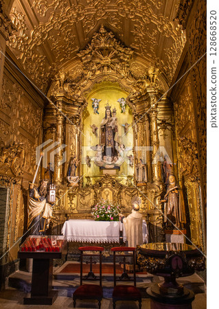 beautiful gold decorated altar in the church Igreja do Carmo in portugal 128668520