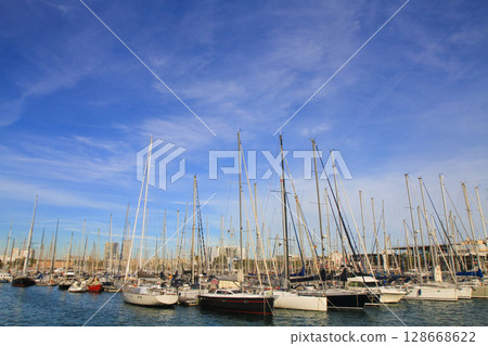 beautiful ships and boats are moored near the shore beautiful ships and boats are moored near the shore 128668622