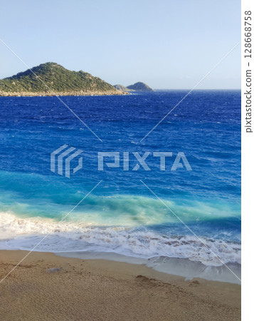 beautiful landscape of a sandy beach on the sea 128668758