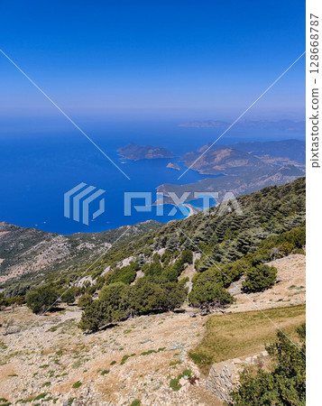 beautiful landscape from babadag mountain to Oludeniz beach in Turkey beautiful landscape from babadag mountain to Oludeniz beach in Turkey 128668787
