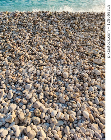 beautiful landscape of a sandy beach on the sea 128668818