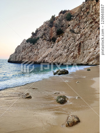 beautiful landscape of a sandy beach on the sea 128668887