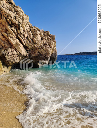 beautiful landscape of the sea against the background of mountains 128668923