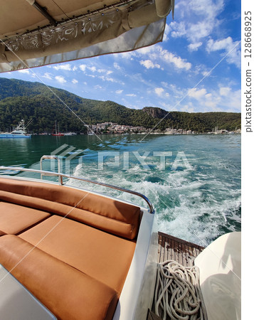 the deck of a boat on a beautiful seascape 128668925
