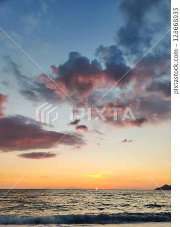 beautiful dramatic landscape of sunset on the sea beach beautiful dramatic landscape of sunset on the sea beach 128668935